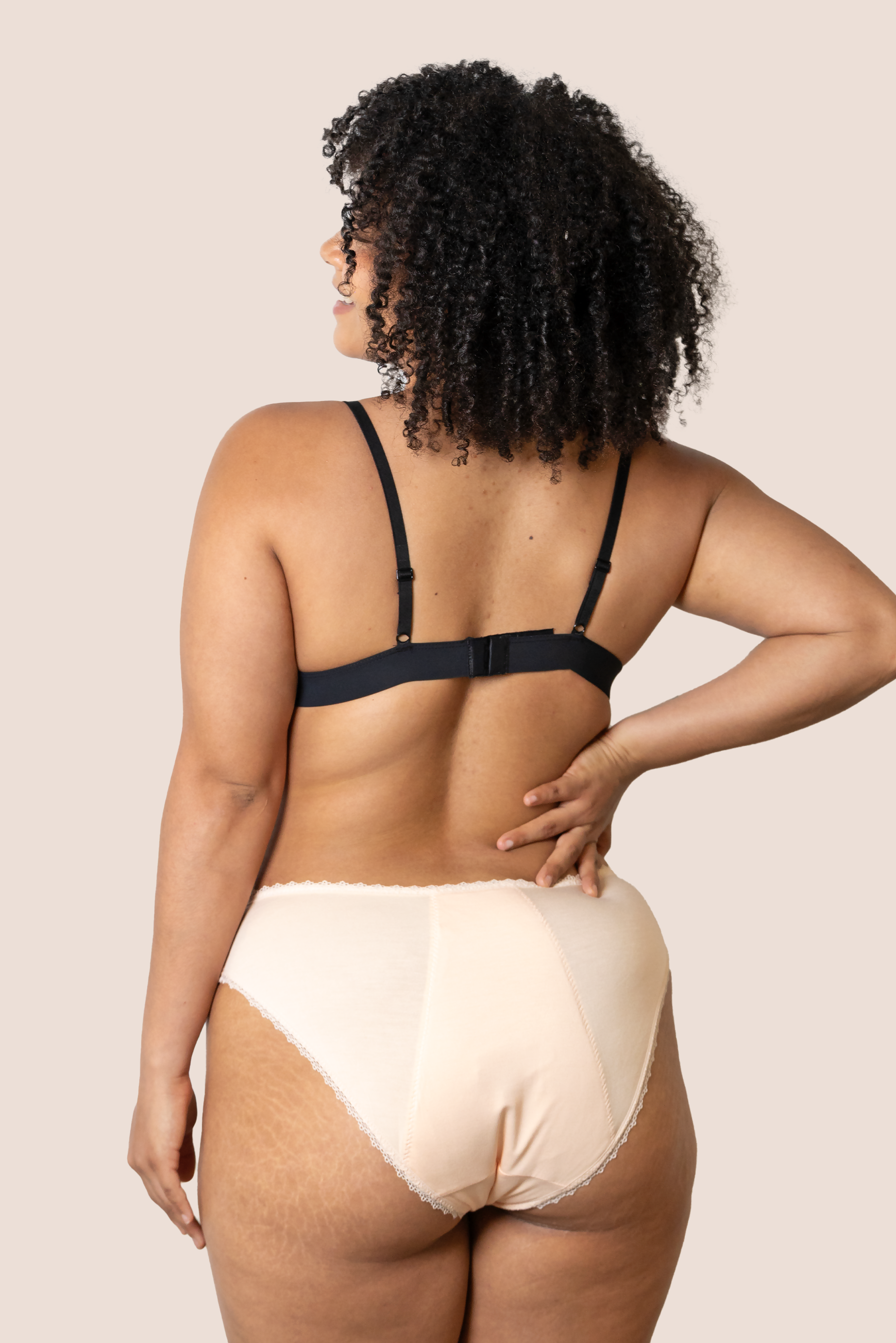 BRAGA CON TRANSPARENCIA BEIGE DETRAS GENERAL