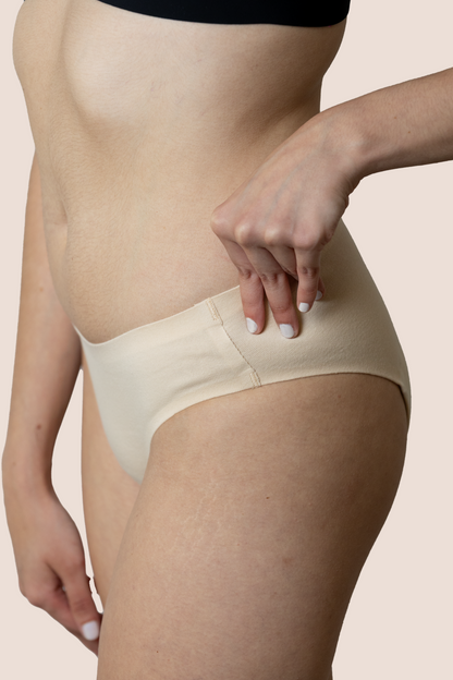 BRAGA SIN COSTURAS BEIGE NINA DETALLE GENERAL